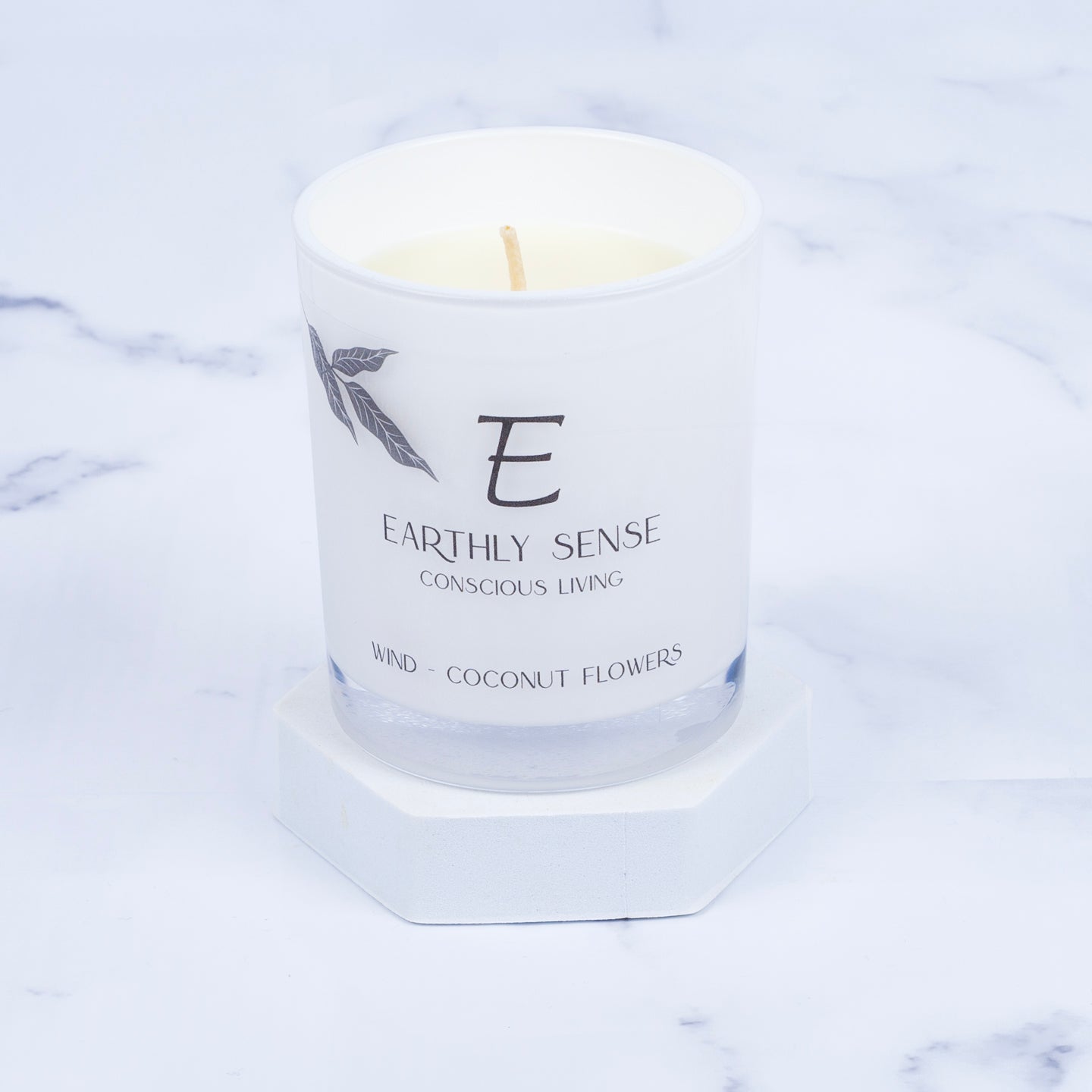 Coconut Flowers Candle by Earthly Sense. Featured in The Pamper Hamper Gift Hamper by Artisan Hamper Company